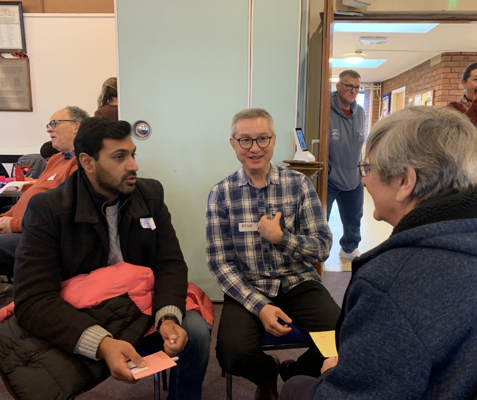 Photo of people at the event talking