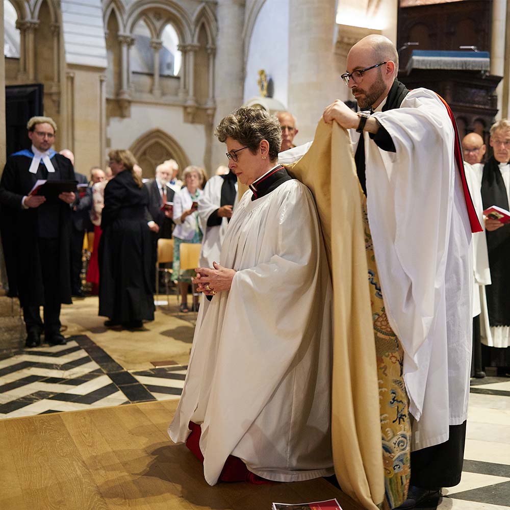 The Dean’s gold cope is removed, and she is vested in the Whittingham cope.