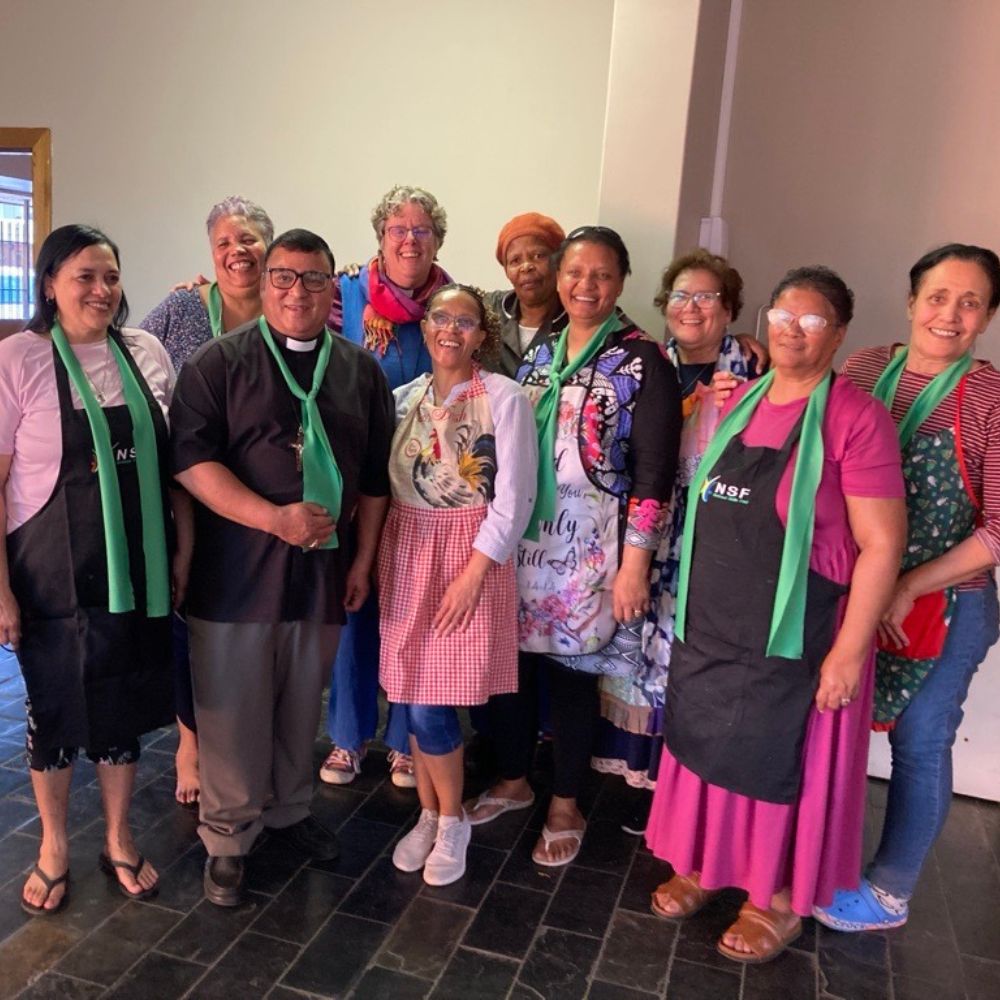 Volunteers from the Kimberley and Kuruman summit - many of them clergy spouses - with Bishop Mary and Bishop Brian