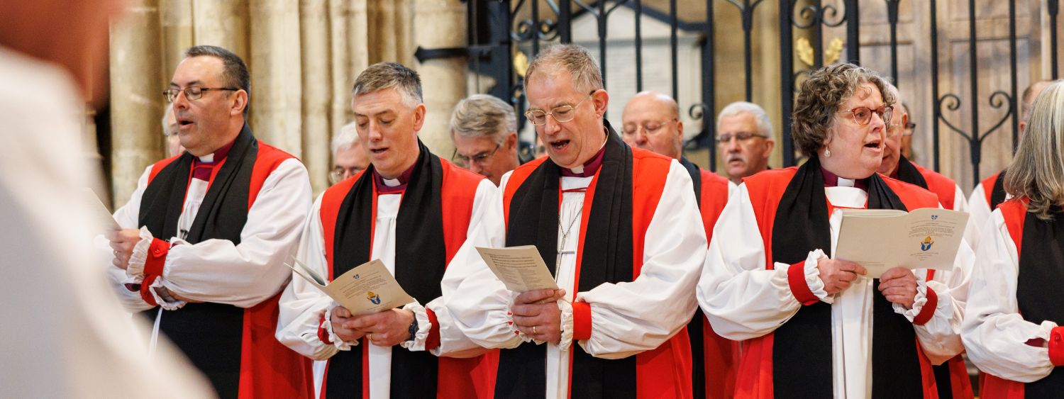 Bishops Gavin, Dave, Steven and Mary sing during the consecration service