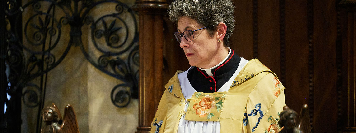 The Dean’s gold cope is removed, and she is vested in the Whittingham cope. The Sub-Dean places the Dean in her stall.