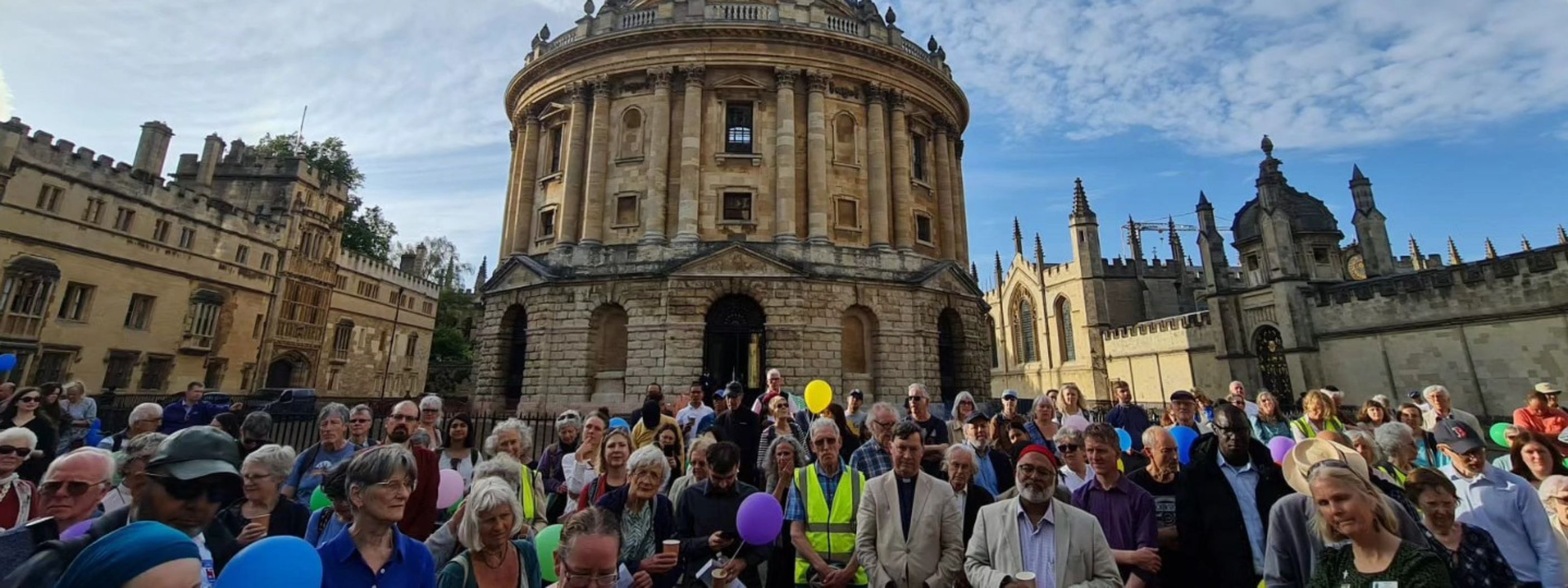 People gather for the Oxford Friendship and Peace Walk. Photo Jawaid Malik