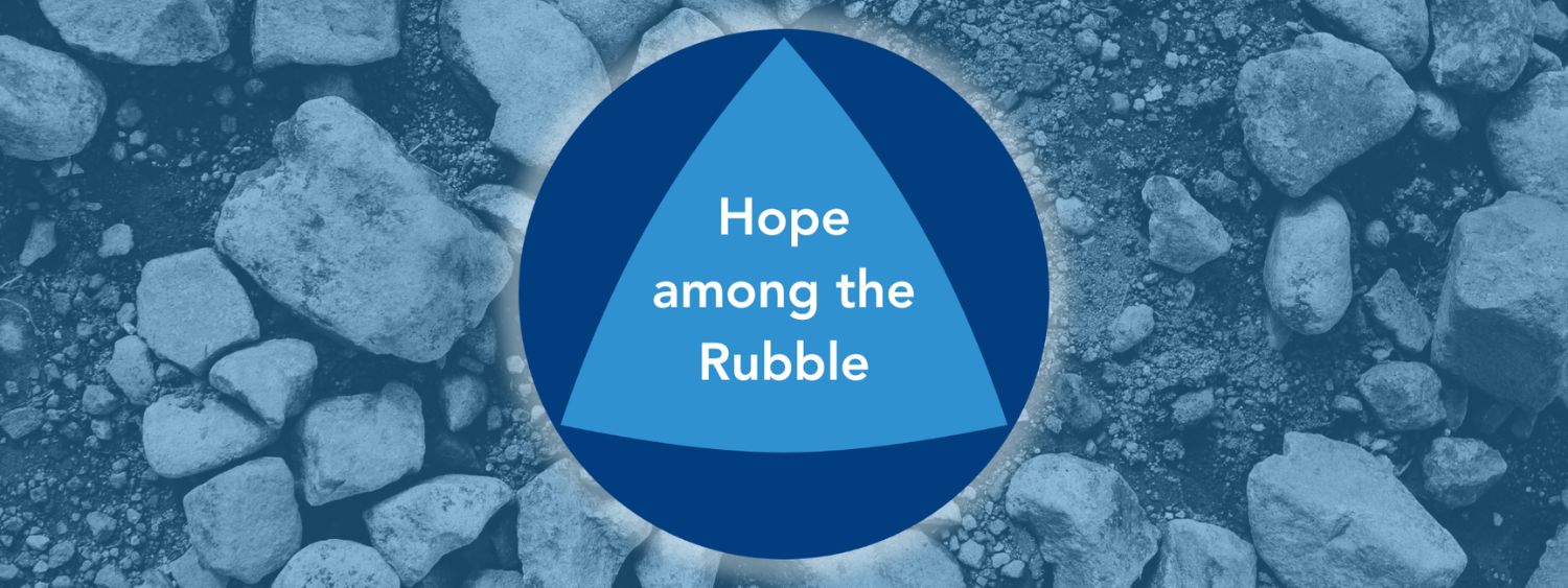 Hope among the Rubble text on a blue tinted photo of a stony floor