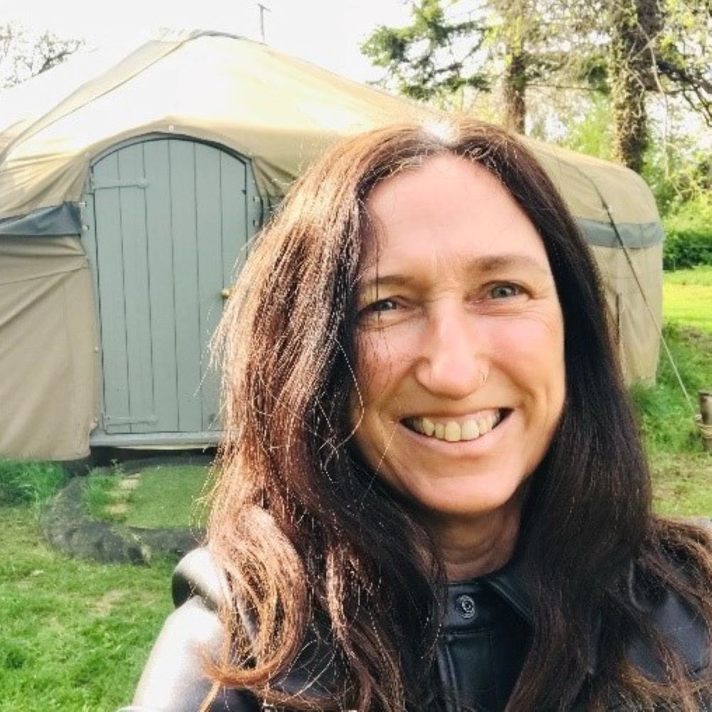 Sue Hughes in front of the yurt church