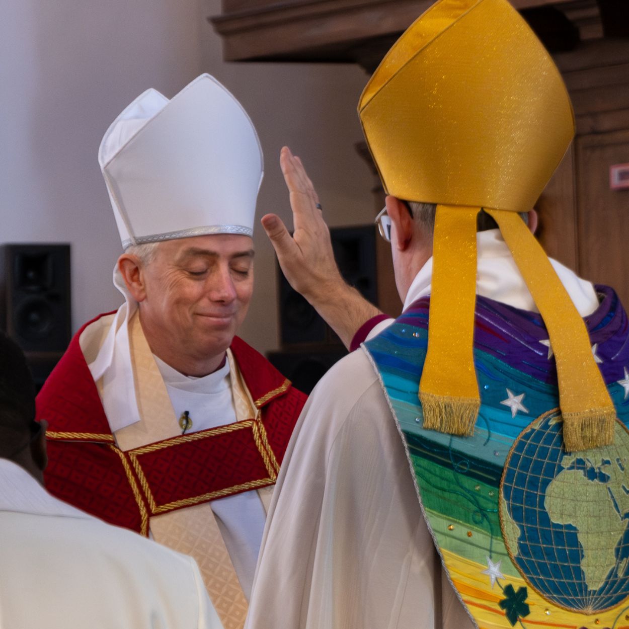 Bishop Steven blesses Bishop Dave at his welcome service