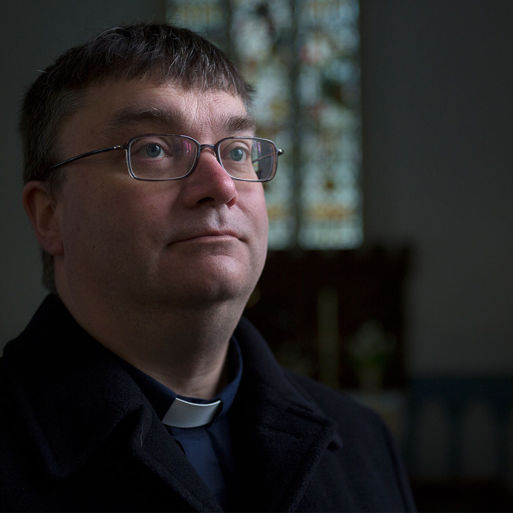 The Ven Guy Elsmore, pictured in a cathedral