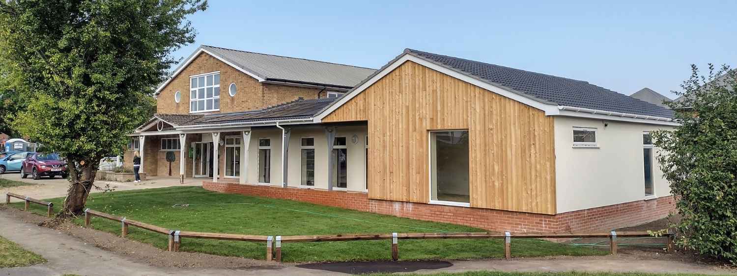 new neighbourhood centre in Woodley in reading, single storey with light wood panelling