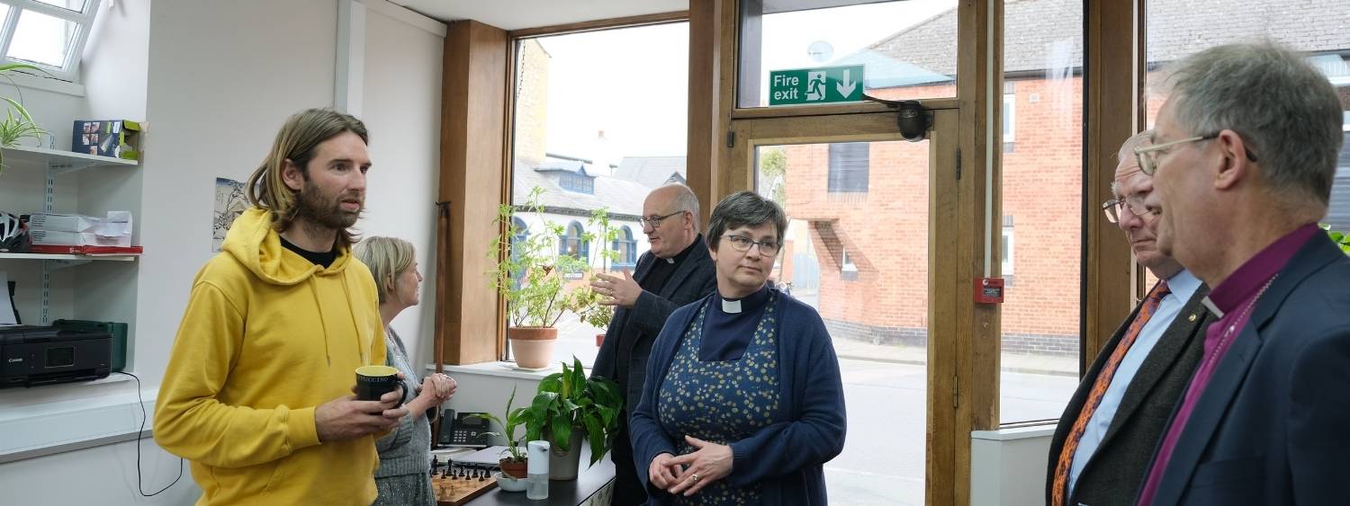 Bishop Steven talks to staff and trustees at the Living Room.