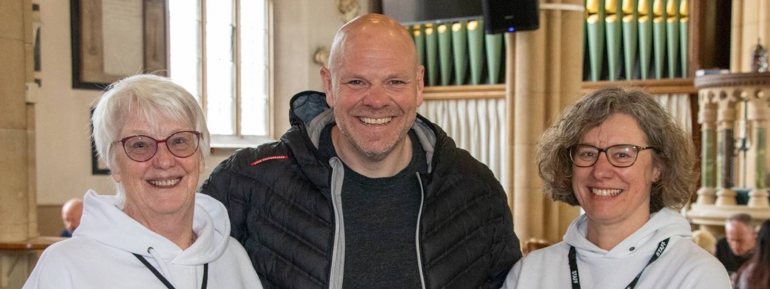 Tom Kerridge with two volunteers at All Saints Church Marlow