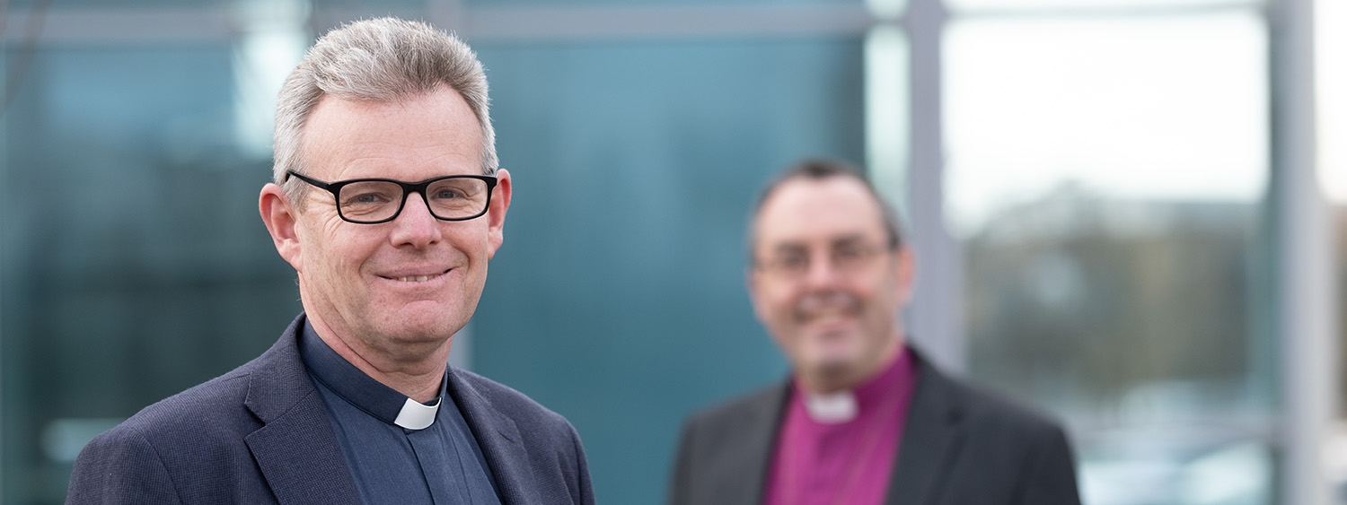 The Revd Canon David Tyler in the foreground and the Bishop of Dorchester in the background.