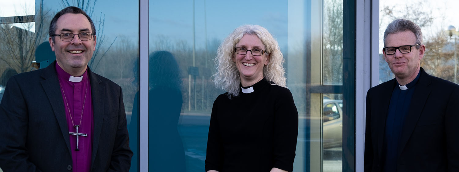 Bishop Gavin, the Revd Preb Jane Haslam and the Revd Canon David Tyler stand outside Church House Oxford.