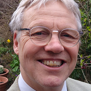 Headshot of Tim Barnett.