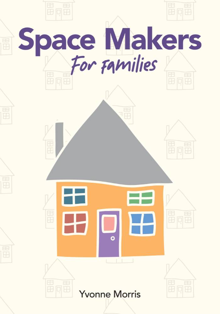 Front cover of booklet with image of house, text reading "Space Makers for Families"